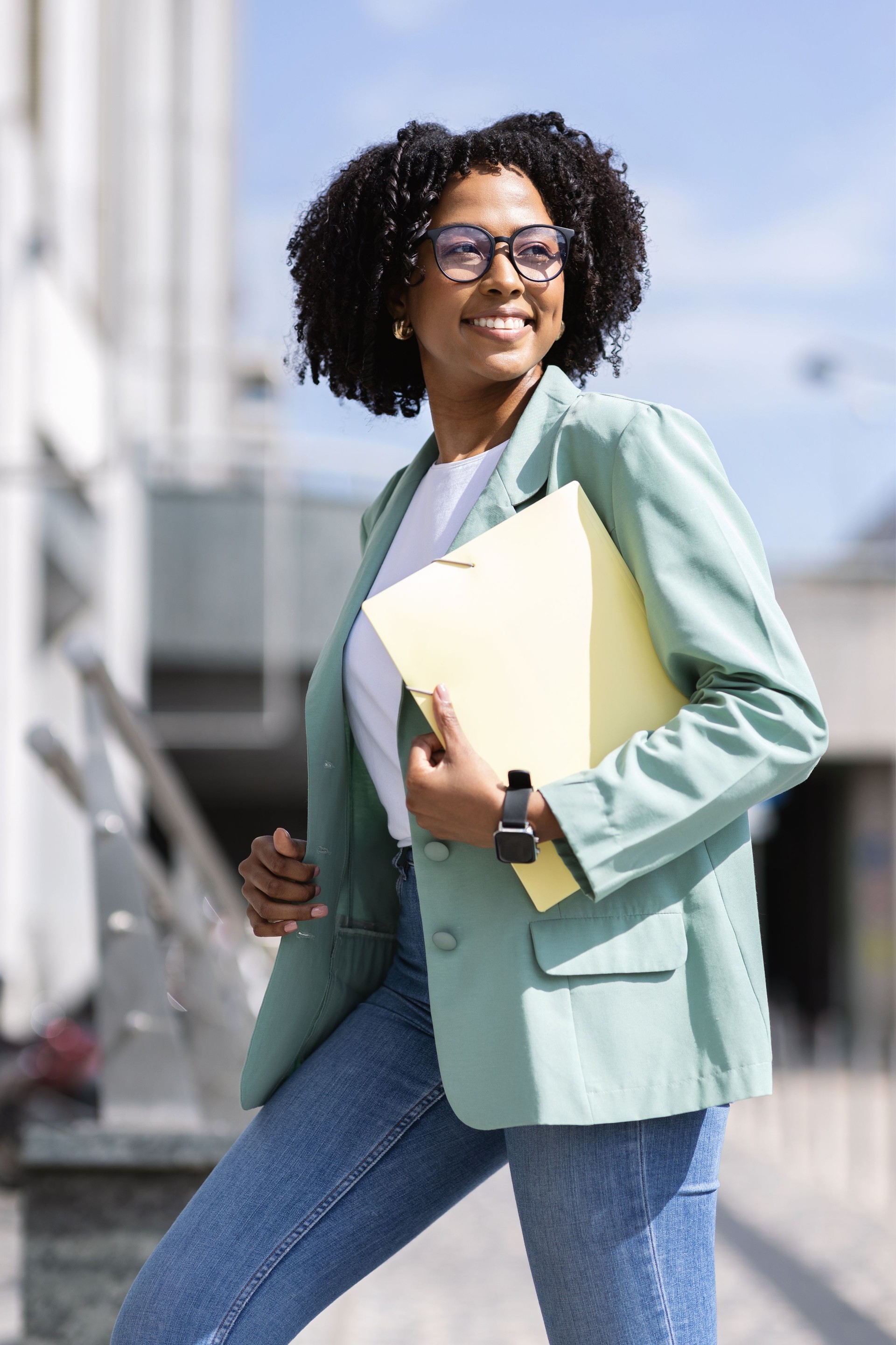 Vertical outdoor shot of beautiful african american business woman